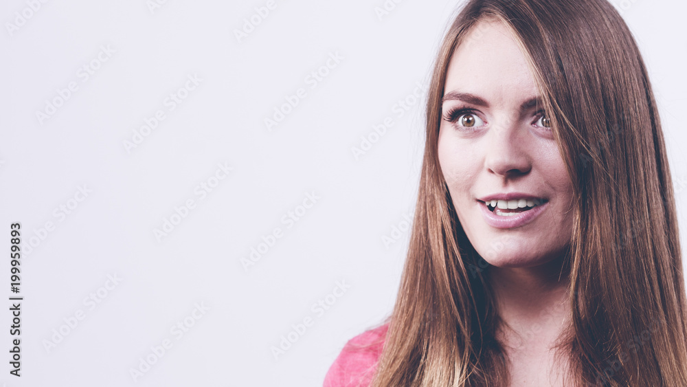 Young woman looking astonished Young woman looking astonished