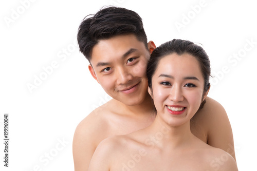 Young happy couple portrait naked on white background