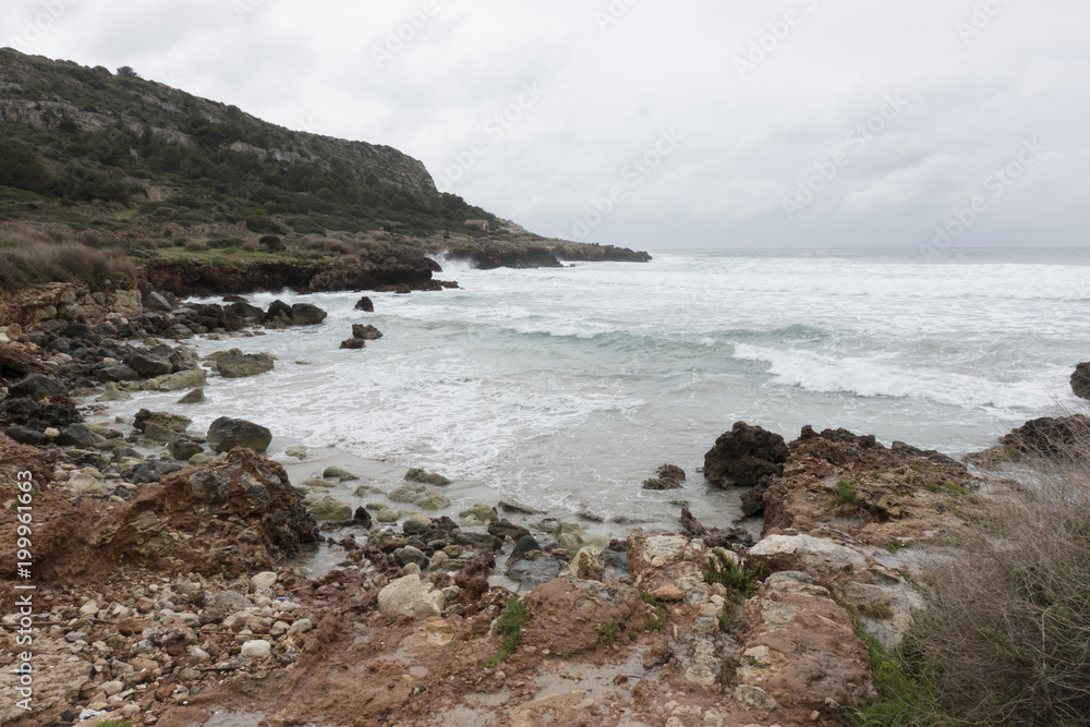 Rocky coast in Son Bou, Menorca, Balearic Islands, Spain