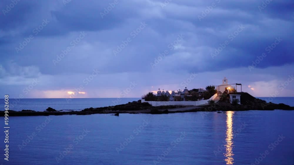 Greece destinations. Chapel and cemetery on sea shore in Agios Fokas near Monemvasia at morning dawn, Laconia region Peloponnese. Time lapse 4K Greece destinations. Chapel and cemetery on sea shore in Agios Fokas near Monemvasia at morning dawn, Laconia region Peloponnese. Time lapse 4K