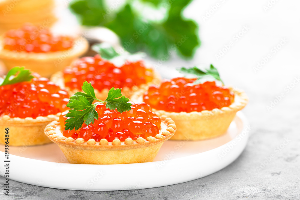 Tartlets with red salmon fish caviar, salmon caviar. Caviar Tartlets with red salmon fish caviar, salmon caviar. Caviar
