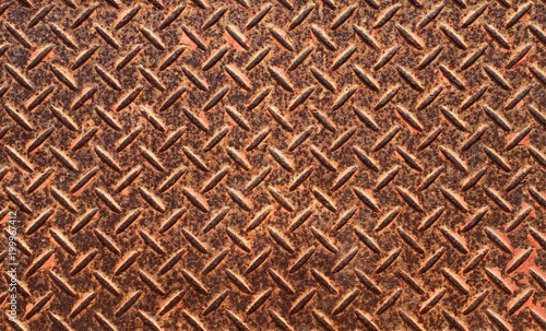 Rusty steel plate texture with rhombus shapes