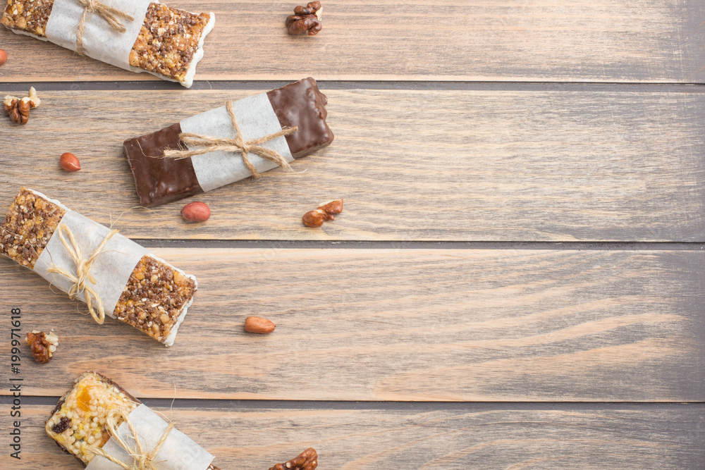 Delicious chocolate granola on a wooden table Delicious chocolate granola on a wooden table