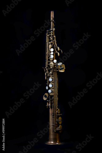 Soprano sax on black background
