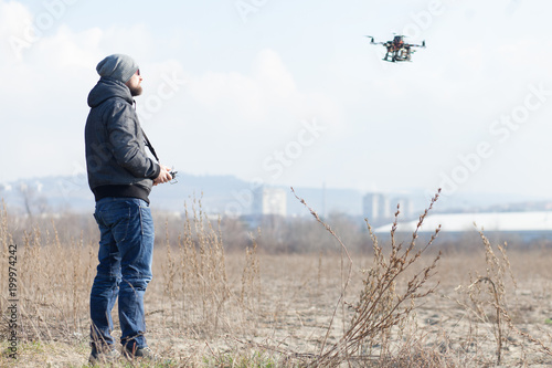 drone user piloting a drone