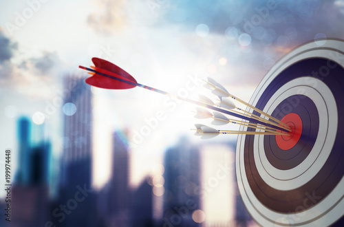 Arrow hit the center of target with modern skyscraper background. Business target achievement concept. 3D Rendering photo