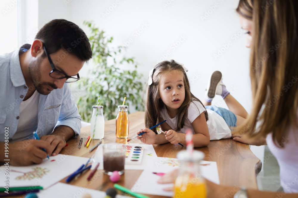 Happy family having fun time at home Happy family having fun time at home