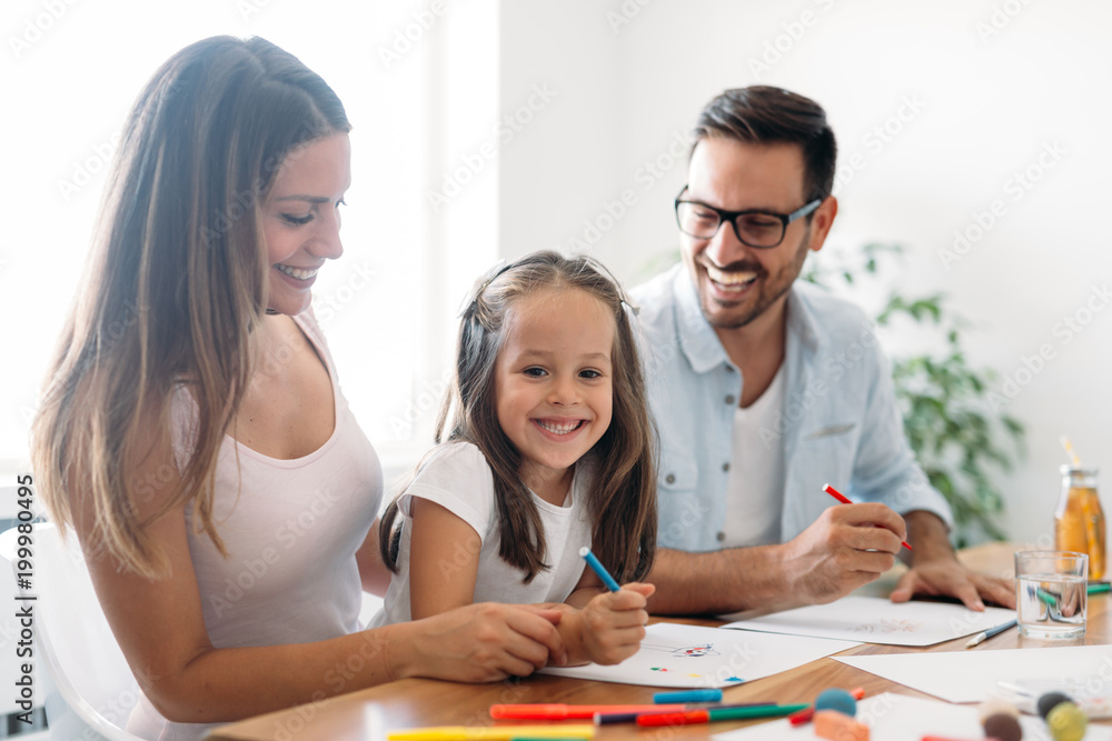 Happy family having fun time at home Happy family having fun time at home