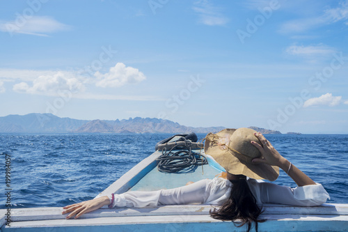 Female tourist enjoying a beautiful seascape © Creativa Images
