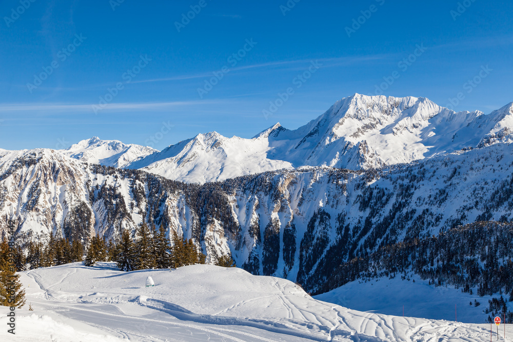 Winter panorama of snowy mountain range in 3 Valleys skiing, snowboard resort, Alps, France