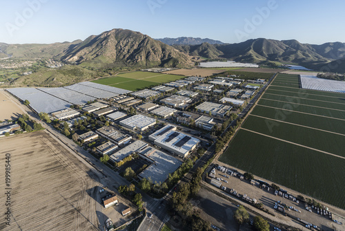 Aerial view of Camarillo farm fields and industrial buildings in Ventura County, California. 