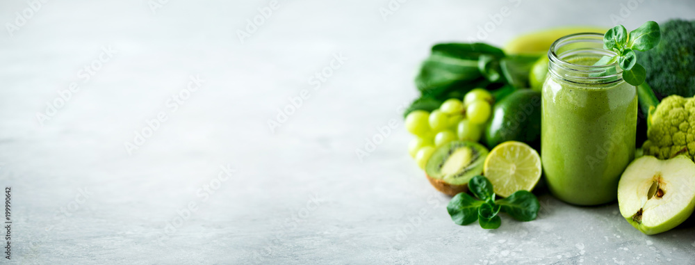 Εκτύπωση καμβά Glass jar mugs with green health smoothie, kale leaves, lime, apple, kiwi, grapes, banana, avocado, lettuce