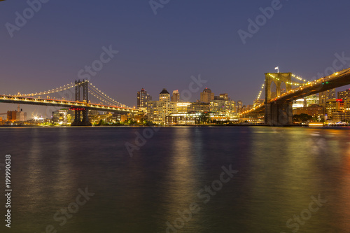 Sunset view of Manhattan Bridge and Brooklyn Bridge  New York