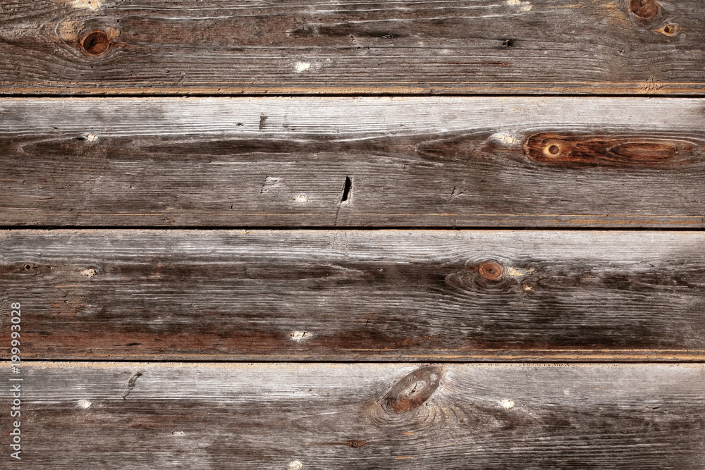 Old wooden surface. The texture of the tree. Wooden background, aged brown board backdrop Old wooden surface. The texture of the tree. Wooden background, aged brown board backdrop