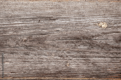 Old wooden surface. The texture of the tree. Wooden background, aged brown board backdrop