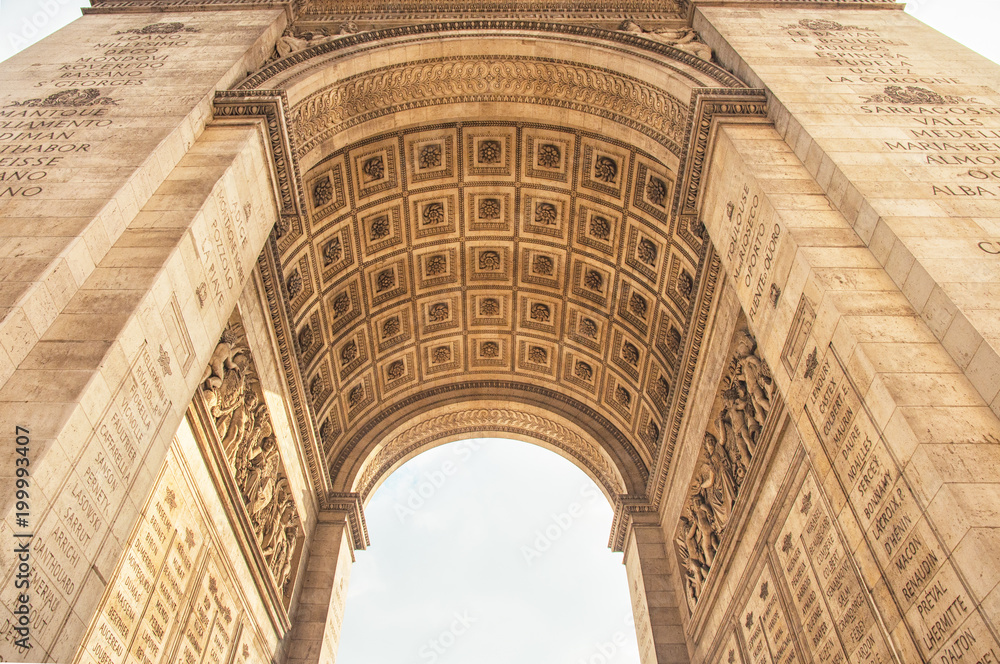 The Arc de Triomphe in paris, seen from below