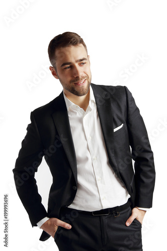 Portrait of a young man dressed in business style on white background.