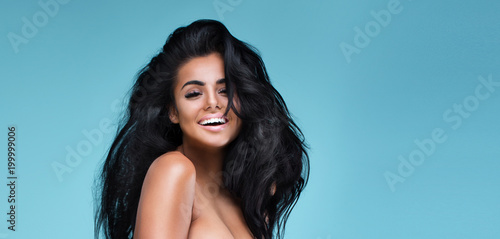 Happy woman with big smile posing.