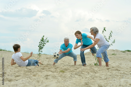 Family playing football