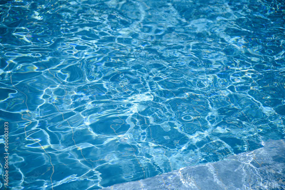 water in swimming pool rippled water detail background water in swimming pool rippled water detail background