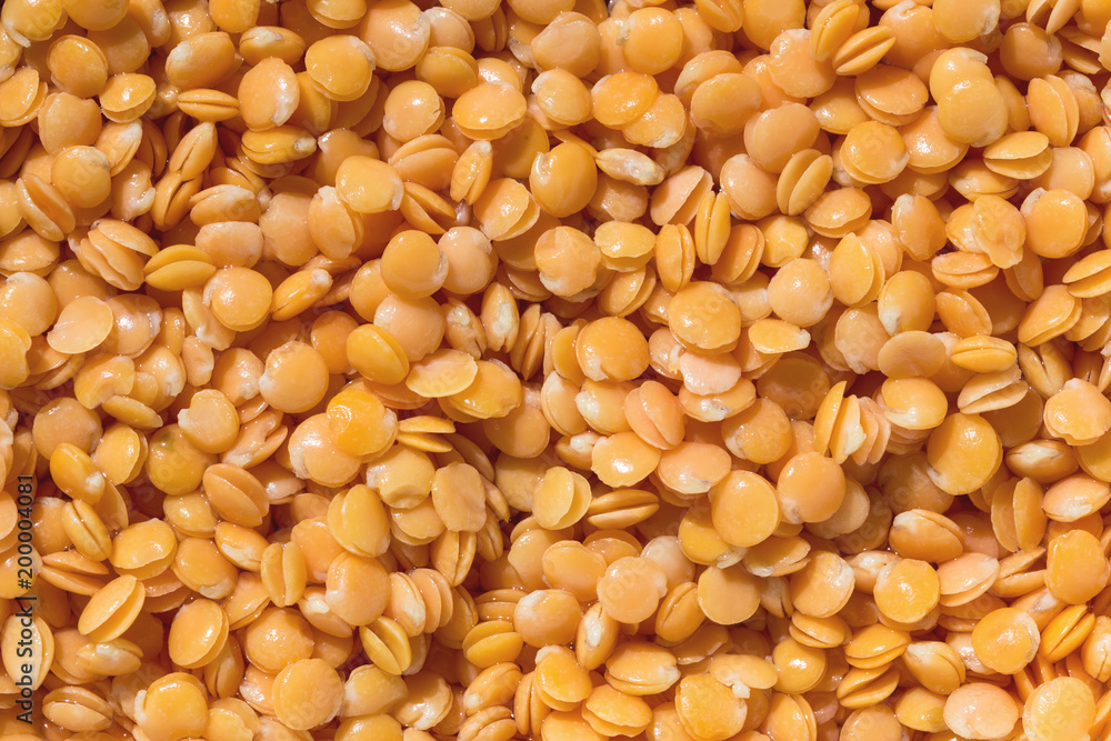 Red lentils texture background. Close-up healthy organic lentil seed. Natural nutriotion diet