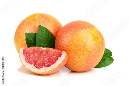 grapefruit and slices with leaves isolated on white background