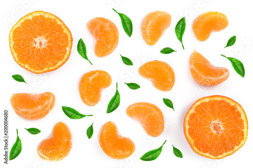 slices of mandarin or tangerine with leaves isolated on white background. Flat lay, top view. Fruit composition