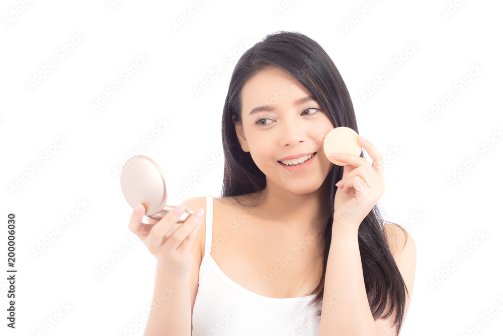 Portrait of beautiful asian woman applying powder puff at cheek makeup of cosmetic, beauty of girl with face smile isolated on white background, wellness and healthcare concept. Portrait of beautiful asian woman applying powder puff at cheek makeup of cosmetic, beauty of girl with face smile isolated on white background, wellness and healthcare concept.