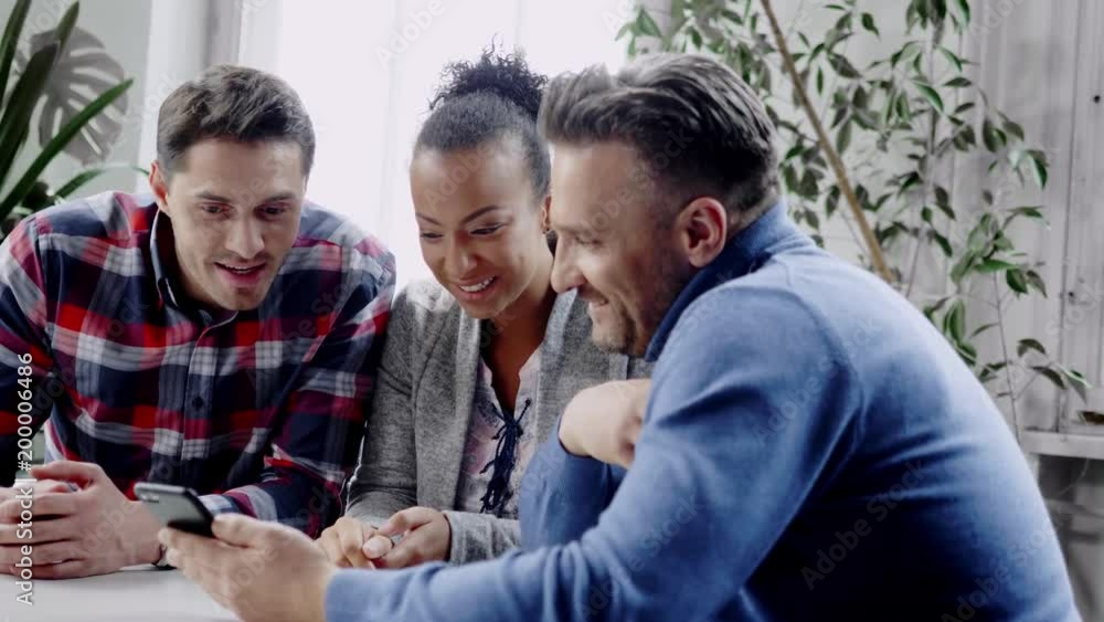 Multi-ethnic colleagues in a coworking office. Multi-ethnic colleagues in a coworking office.