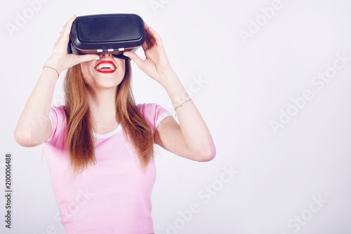 Woman using VR headset. Beautiful girl, VR experience isolated on white. Visual reality concept. Woman getting experience using VR. Future, play.