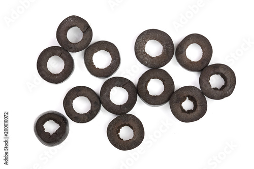 sliced black olives isolated on white background. Top view. Flat lay pattern