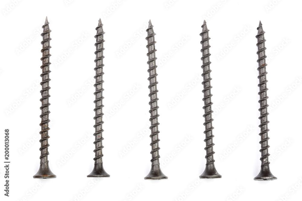 black screws isolated on white background closeup. Top view. black screws isolated on white background closeup. Top view.
