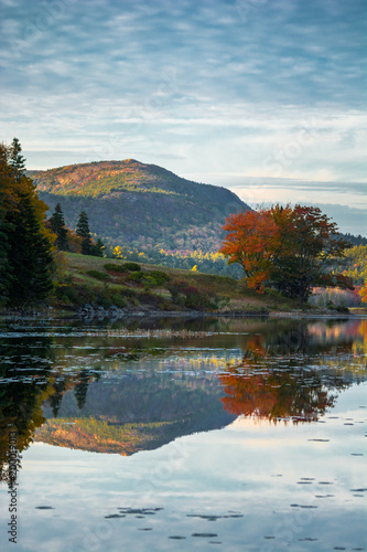 Fototapeta Naklejka Na Ścianę i Meble -  Acadia National Park during fall foliage season reflecting in the water