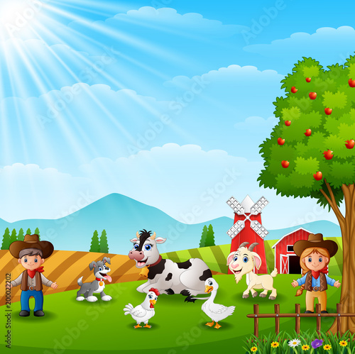 The cowboy and cowgirl at the farm with animals 