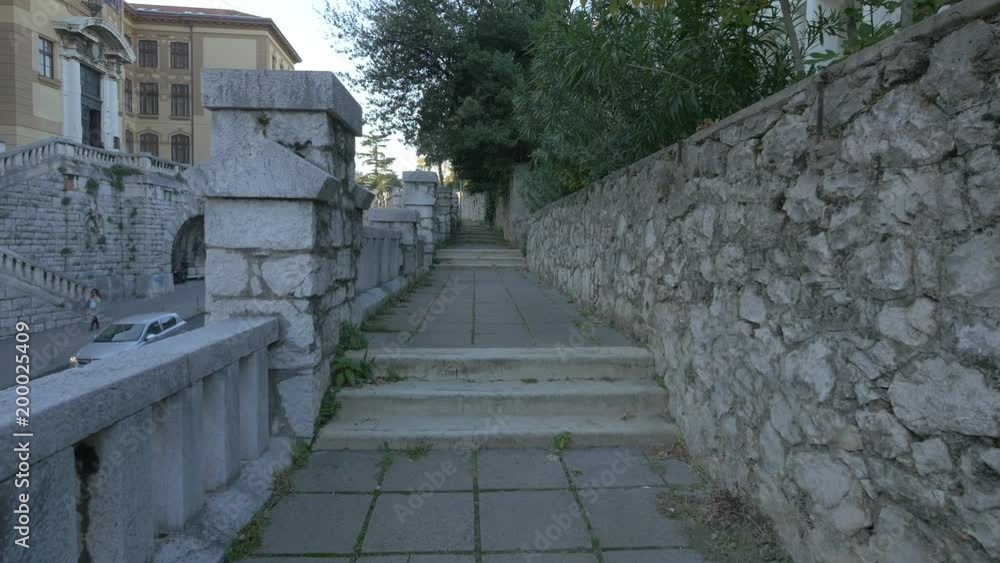 Steps and stone railings on an alley Steps and stone railings on an alley