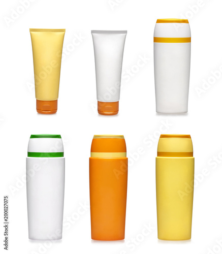 Generic plastic bottles  of sunscreen creams isolated on white background
