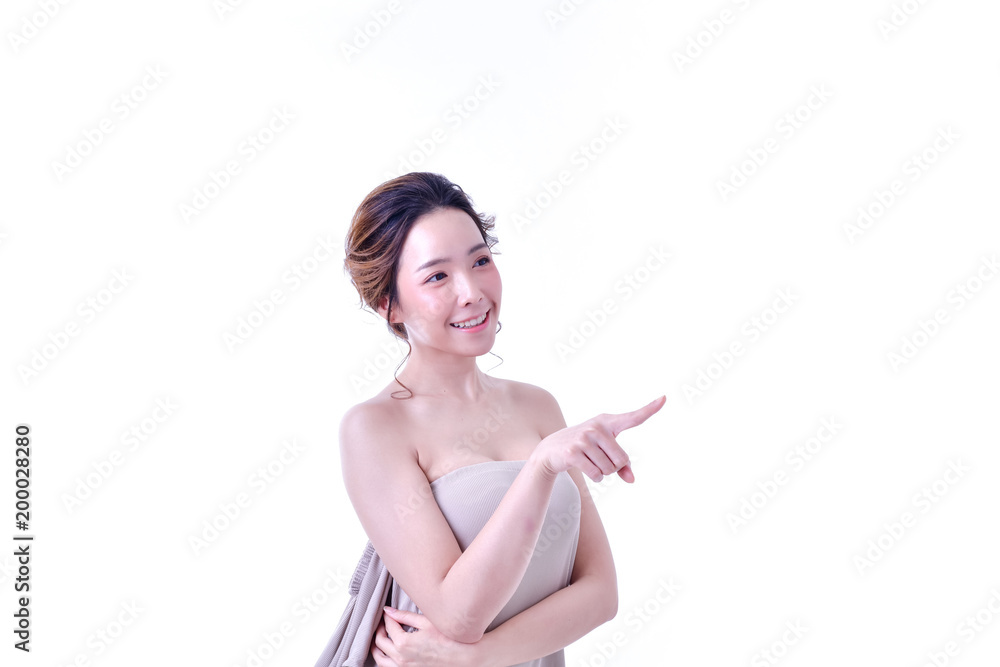 The concept of healthy beautiful woman. Beautiful women keep healthy. Beautiful women are present. Beautiful woman pointing fingers on white background. The concept of healthy beautiful woman. Beautiful women keep healthy. Beautiful women are present. Beautiful woman pointing fingers on white background.