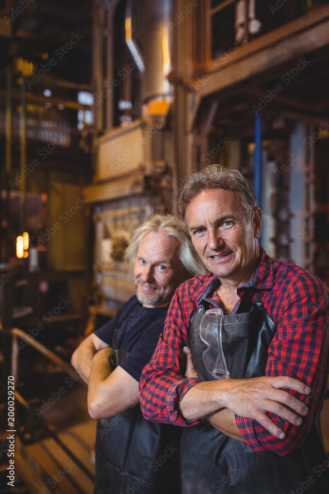 Portrait of glassblowers with arms crossed Portrait of glassblowers with arms crossed