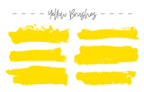 Set of yellow ink brush strokes