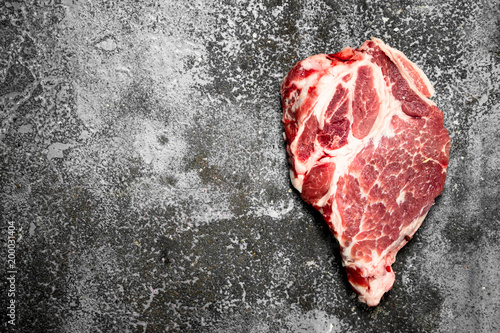 Raw beef steak.