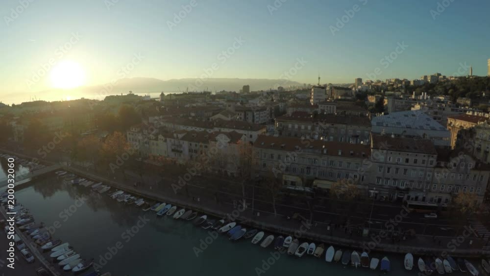 Aerial view of rooftops and anchored boats Aerial view of rooftops and anchored boats