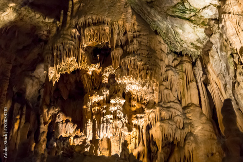 Postojna cave, Slovenia. Formations inside cave with stalactites and stalagmites © marabelo