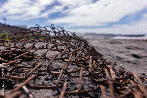 Old Rusted Chainlink Fence by the Beach