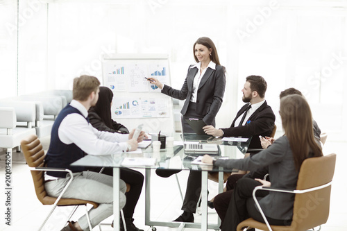  business team gives a presentation of a new financial project for the business partners of the company