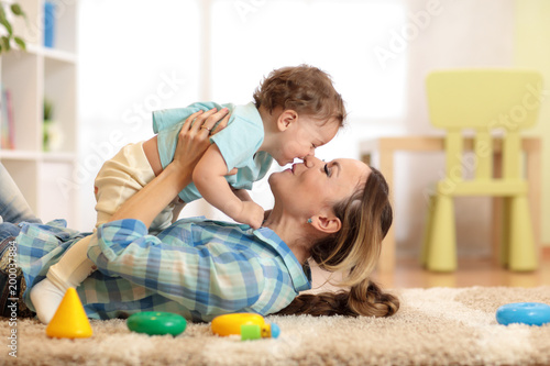 Woman with child one year o...