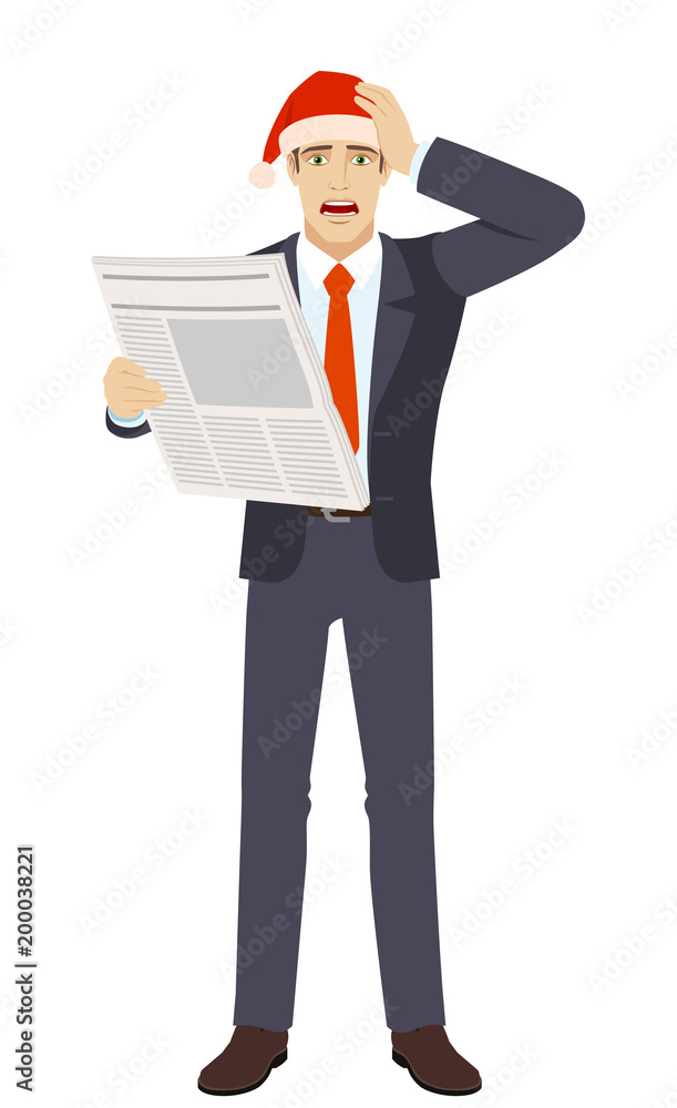 Bad news. Businessman in Santa hat with newspaper grabbed his head. Bad news. Businessman in Santa hat with newspaper grabbed his head.