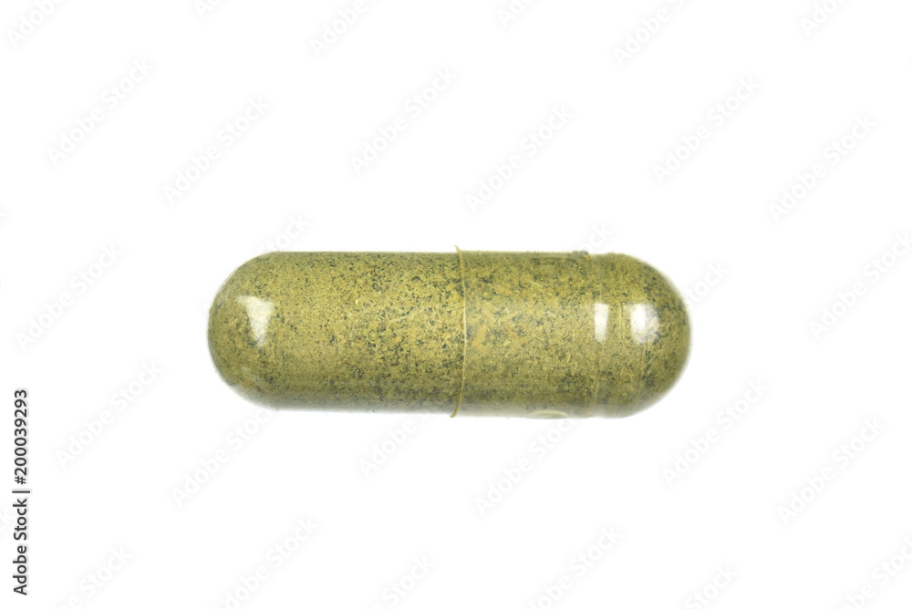herb capsule with green herbal leaf isolated on white background herb capsule with green herbal leaf isolated on white background