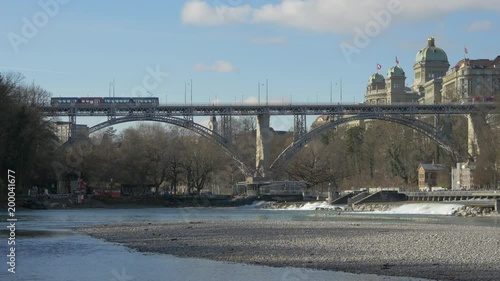 Trams crossing the Kirchenfeldbrucke bridge  photo