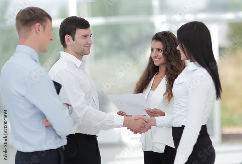 Wallpaper Mural handshake business women and business partner Torontodigital.ca