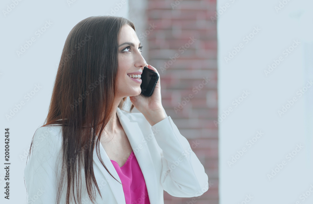 successful woman talking on mobile phone successful woman talking on mobile phone